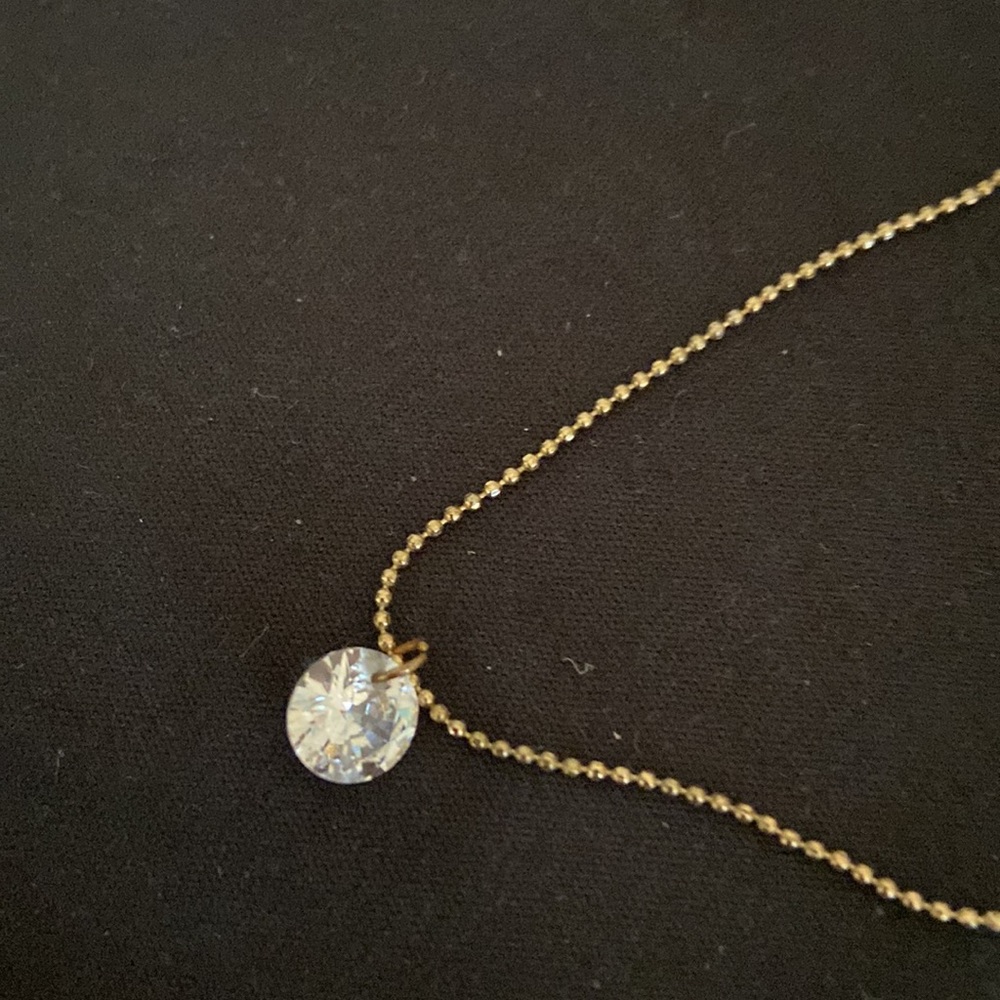 Gold Tone Pendant Necklace with Clear Round Crystal